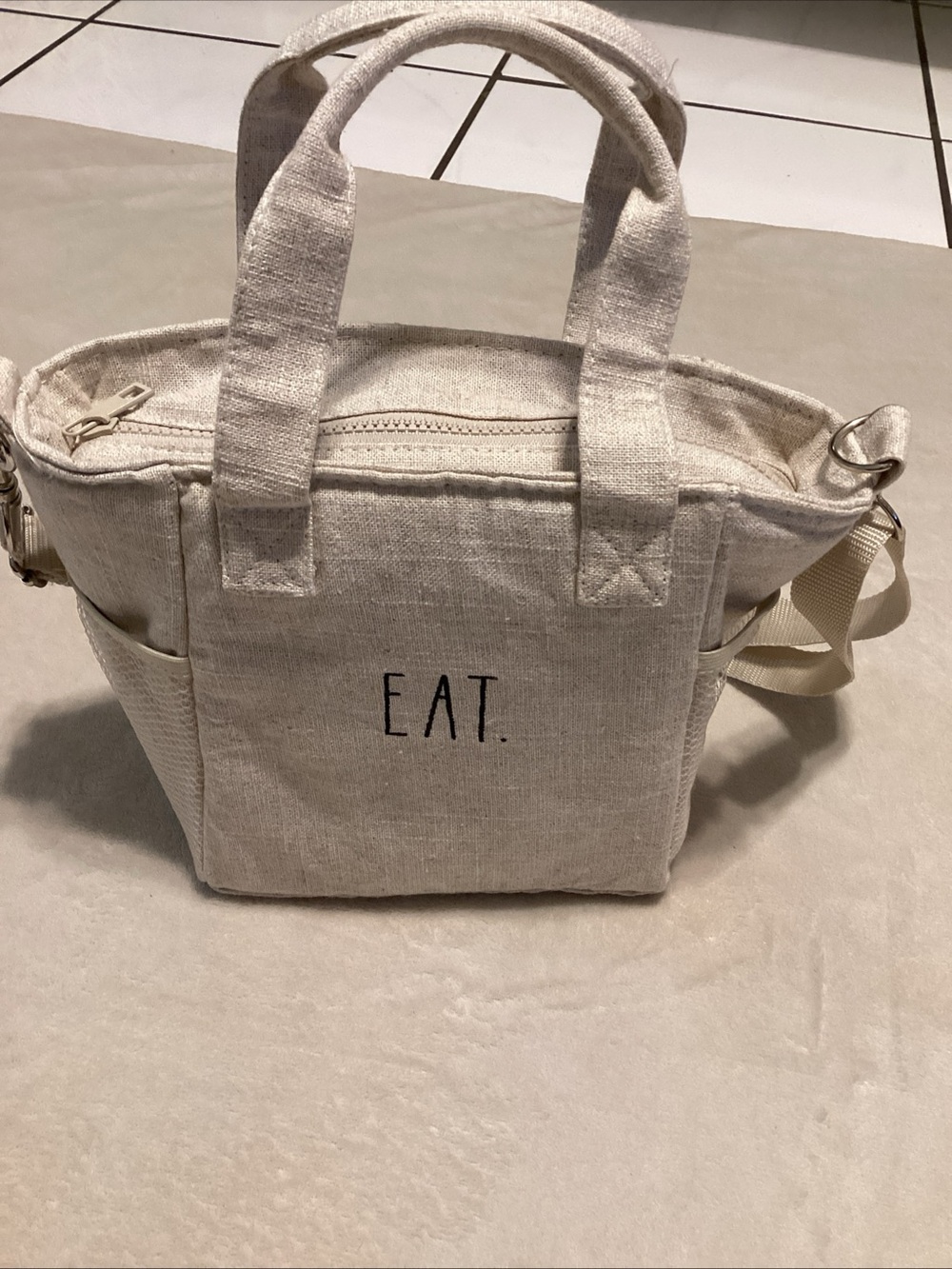 Rae Dunn Cream Canvas Lunch Tote with "EAT." Black Lettering